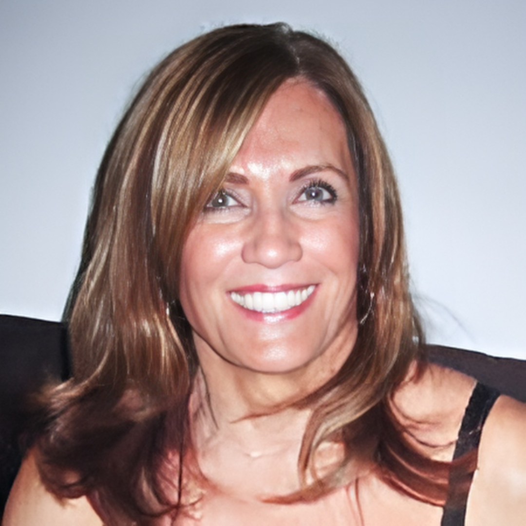 A smiling woman with long hair.