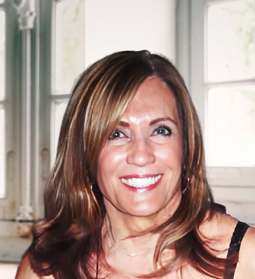 A smiling woman with long hair.